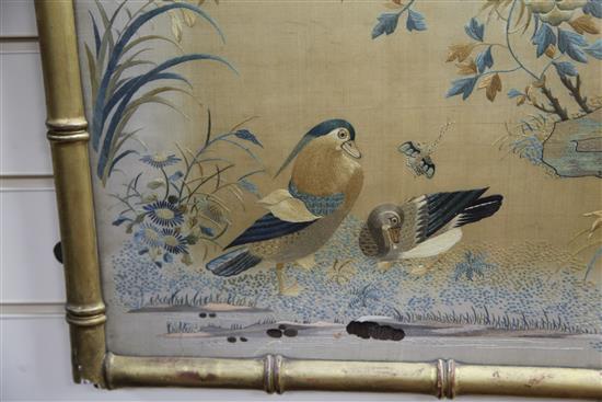 A good Chinese Canton embroidered silk bird panel, late 19th century, 113cm x 74cm, in a gilt faux bamboo frame, discoloured